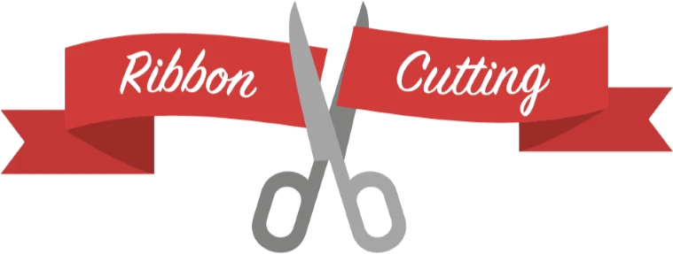 scissors cutting red ribbon